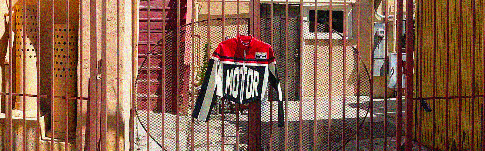 a jacket on a fence