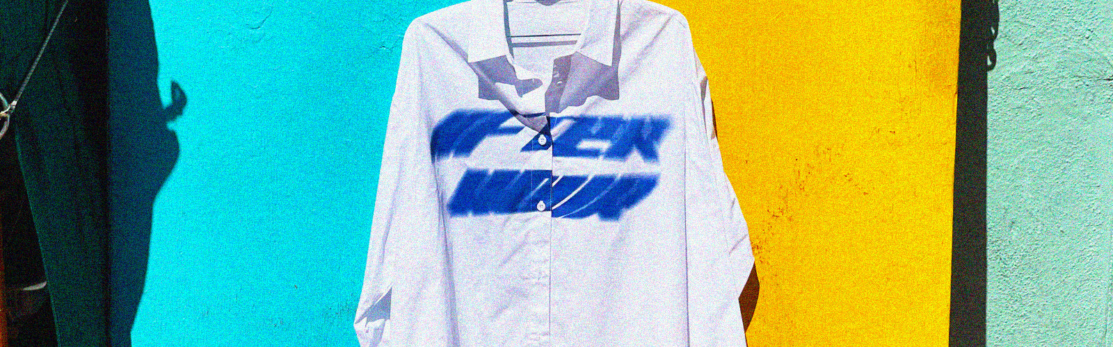 a white shirt with blue text on it
